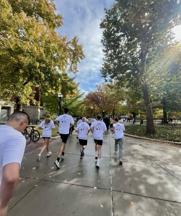 Group of ROTC runners heading toward finish line